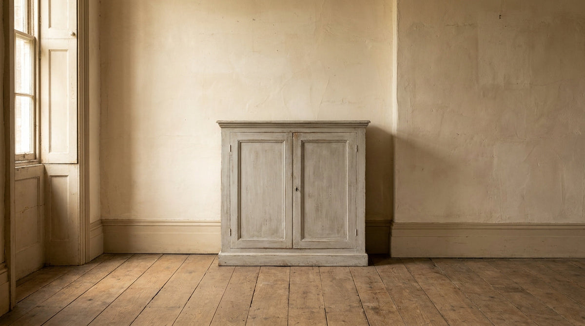 Lifestyle scene featuring a painted pine cabinet with a Gustavian grey finish. AI-generated supplementary image; refer to primary product photos for color and material accuracy.