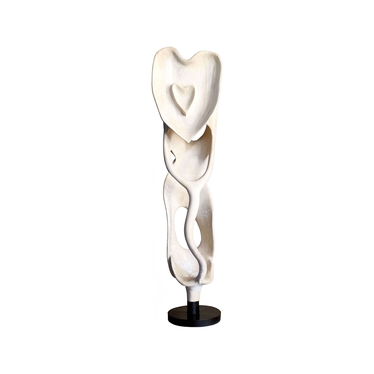Tall hand-carved mango wood sculpture with stacked organic forms