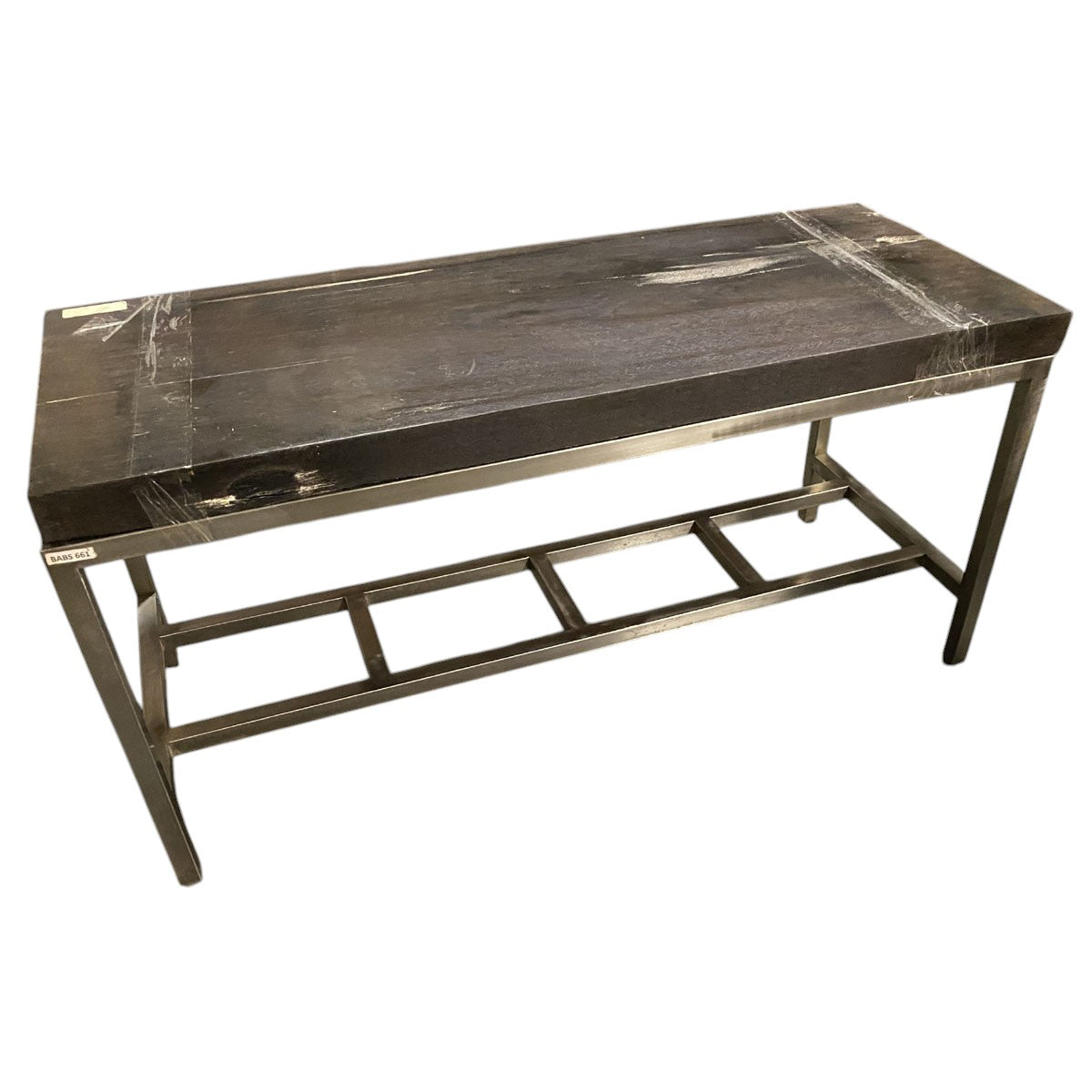 Rectangular petrified wood table with stone top on a minimal metal base