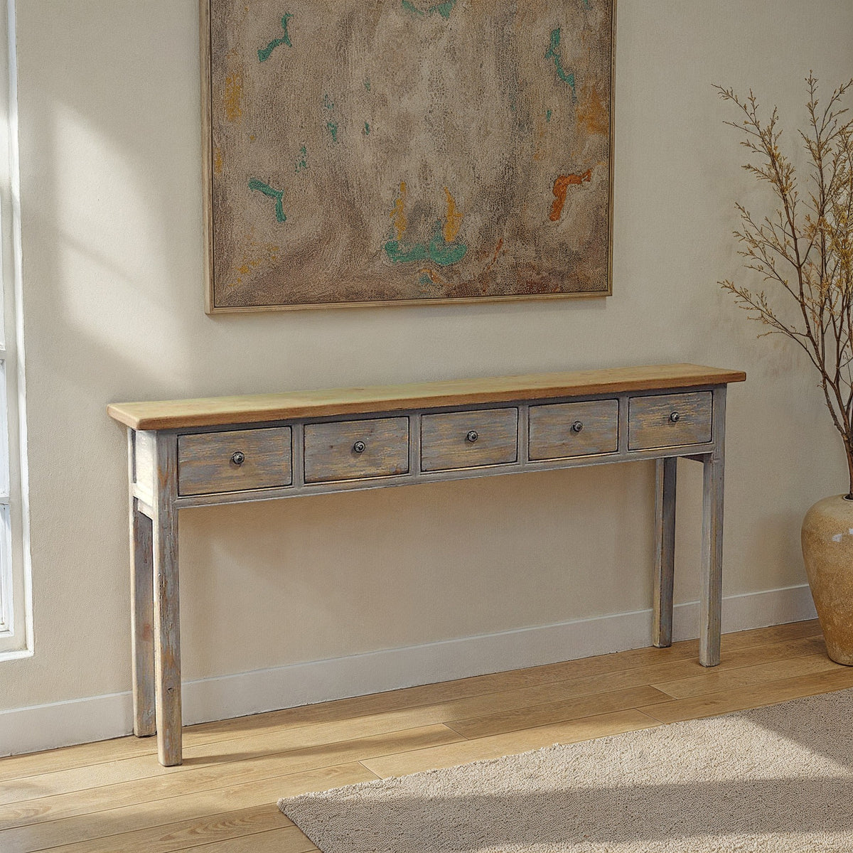 Narrow reclaimed pine console table with five drawers and straight legs