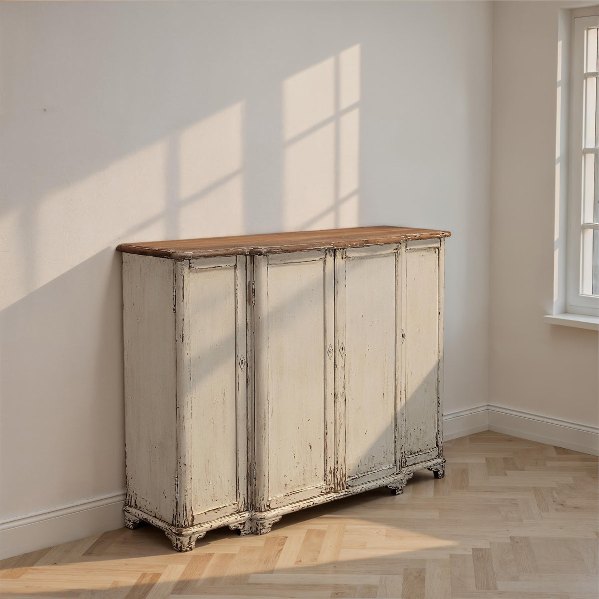 Tall reclaimed pine four-door server in an antique white finish