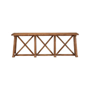 Narrow reclaimed pine console table in distressed cream with cross-braced base
