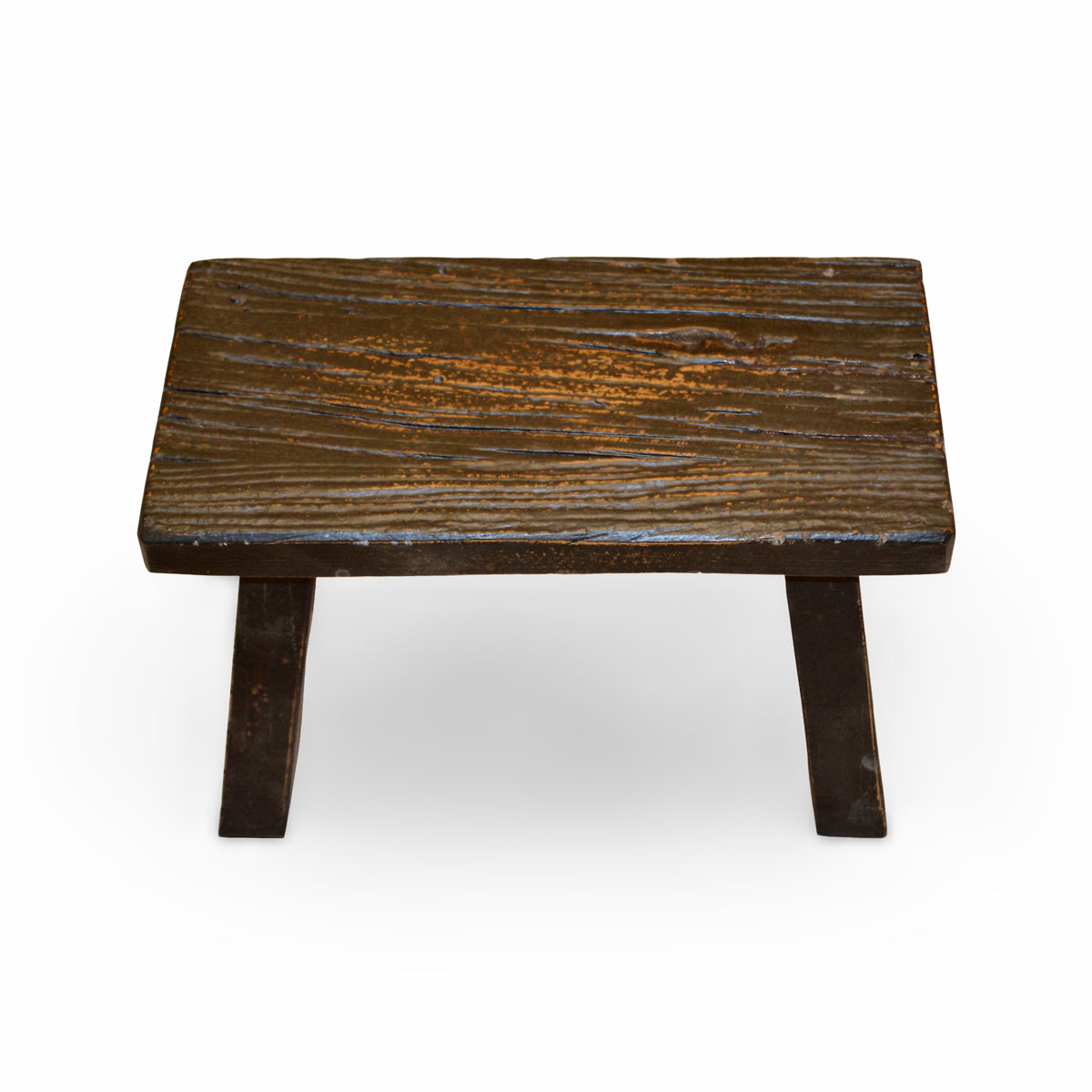 Small stool in elm with a deep black finish and angled legs