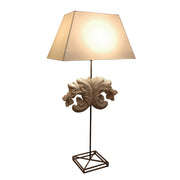 Bayonne table lamp with slender stem, open geometric base and shade