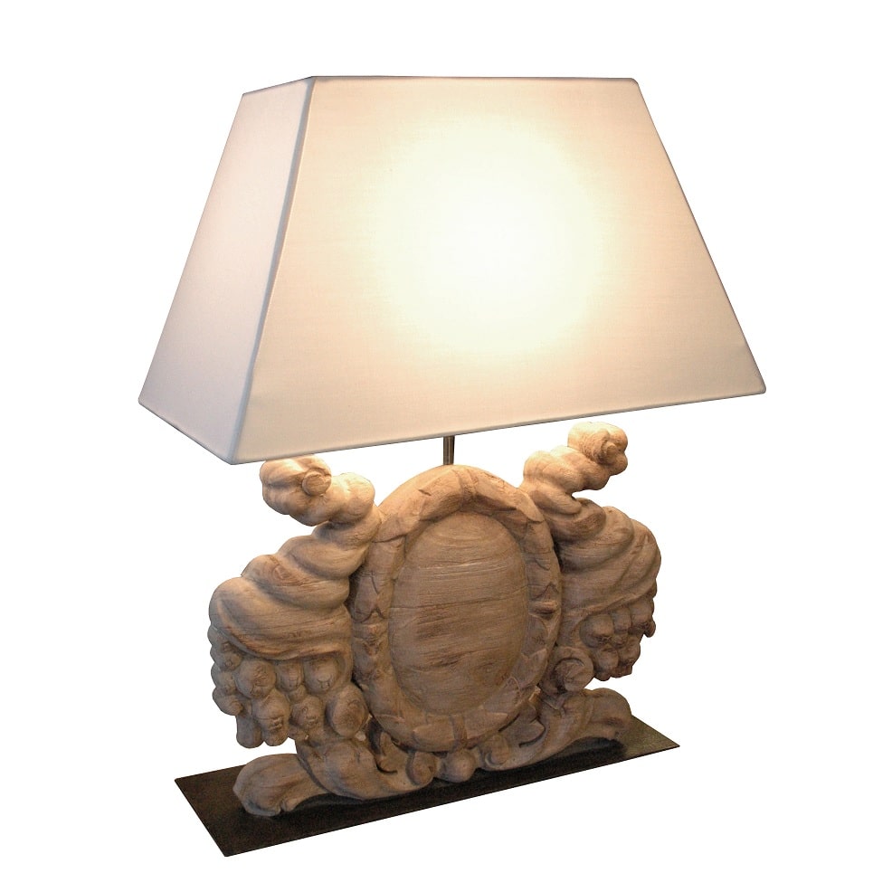 Biarritz table lamp with horizontal carved base, oval motif and shade