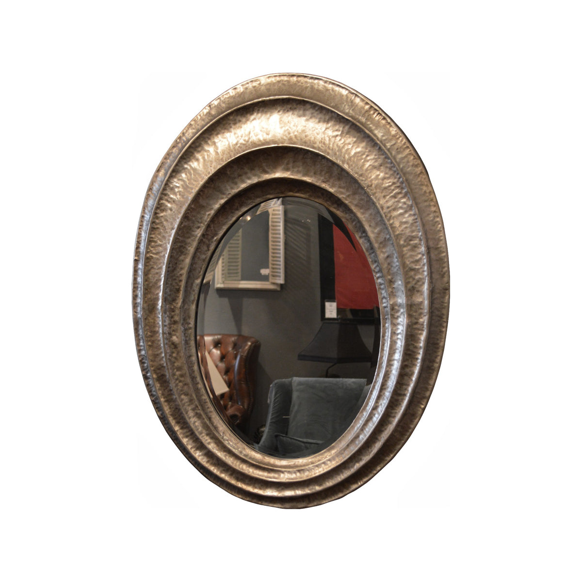 Oval mirror in a hammered silver-toned metal frame