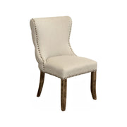 Linen side chair with tufted back detail on an oak frame