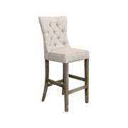 High-back bar stool upholstered in ecru linen on a wood frame
