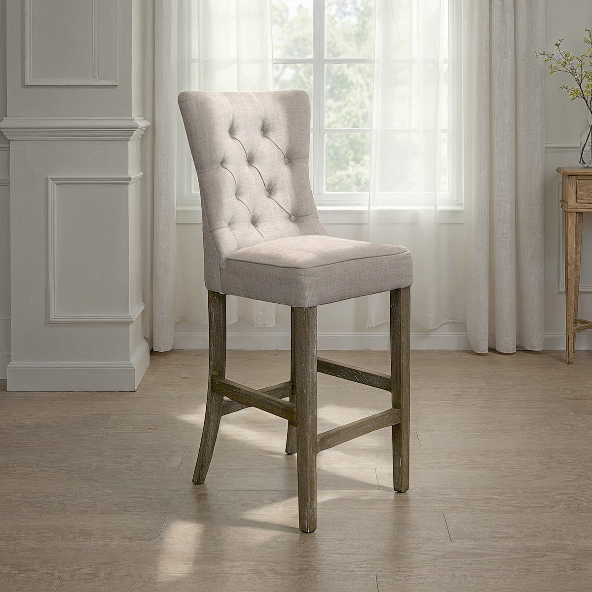 High-back bar stool upholstered in ecru linen on a wood frame