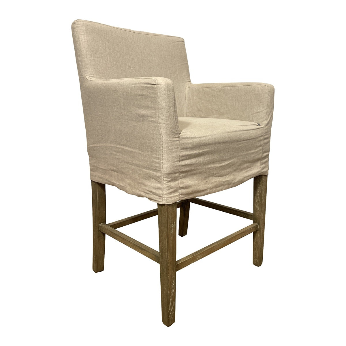 Ecru linen slipcovered counter stool with arms on a wood frame