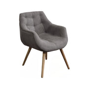 Modern upholstered armchair on oak legs