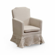 Birchwood head chair dressed in a linen slipcover