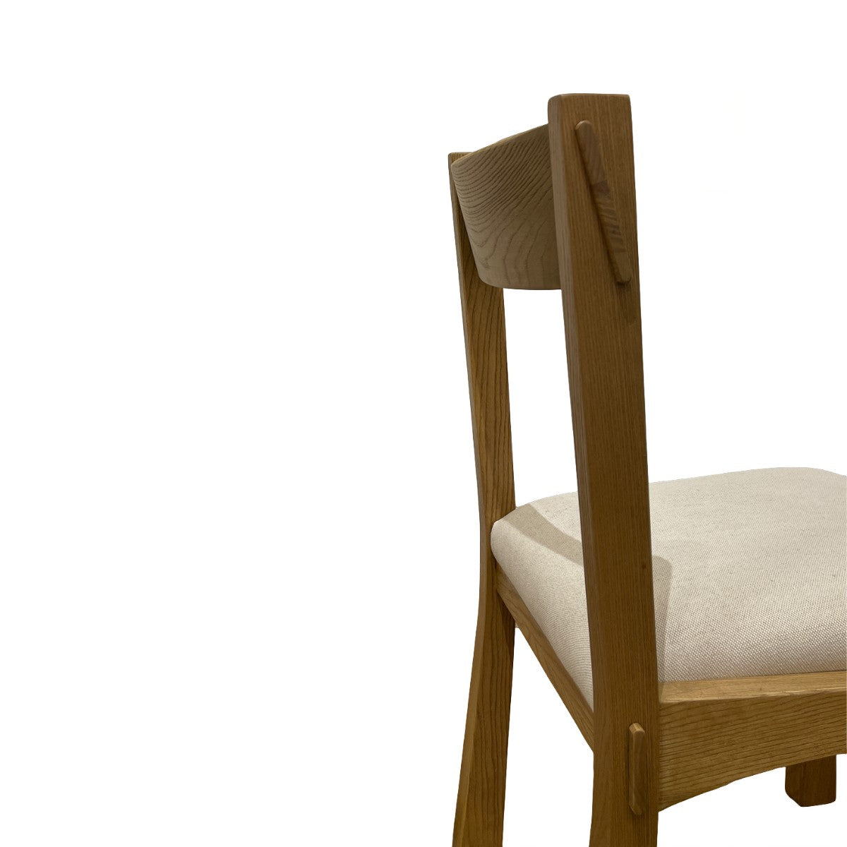 Ashwood dining chair with a solid backrest and upholstered seat