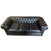 Black leather chesterfield sleeper sofa with button tufting and nailhead trim