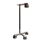 Chrome knuckle joint table lamp with exposed mechanical joints