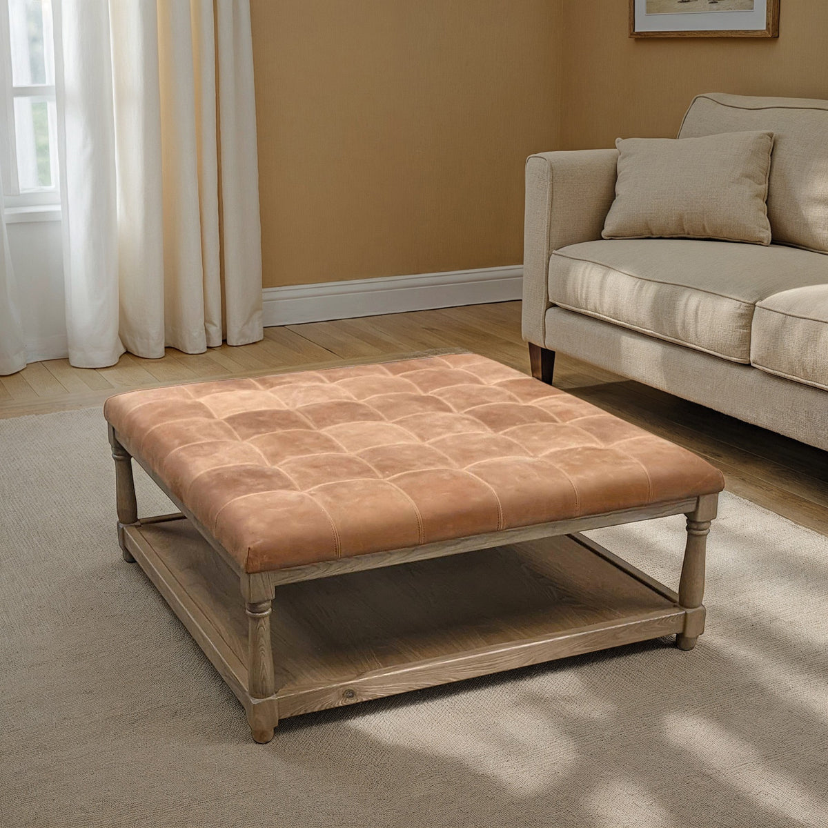 Tufted leather ottoman on an oak frame with a lower shelf