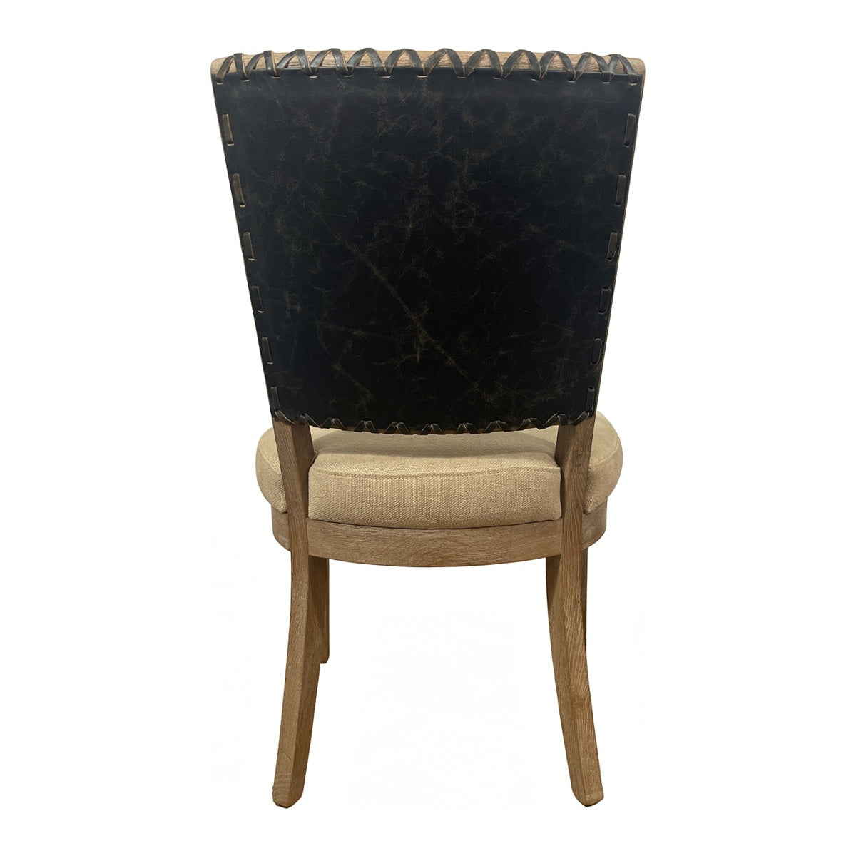 Side chair with a black leather back and upholstered seat on an oak frame