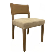 Side chair with a brown leather back and upholstered seat on an oak frame