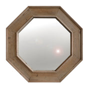 Octagonal mirror framed in reclaimed pine with visible grain