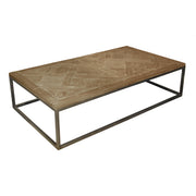 Long reclaimed pine coffee table in washed finish on a minimal metal frame