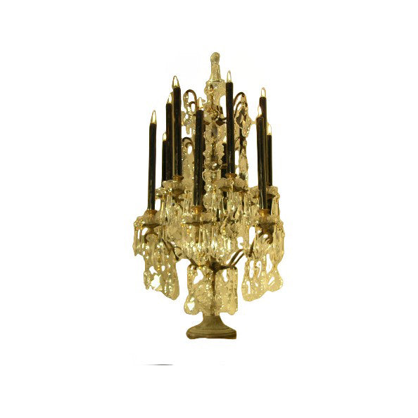 Tall twelve-arm metal candelabra centerpiece