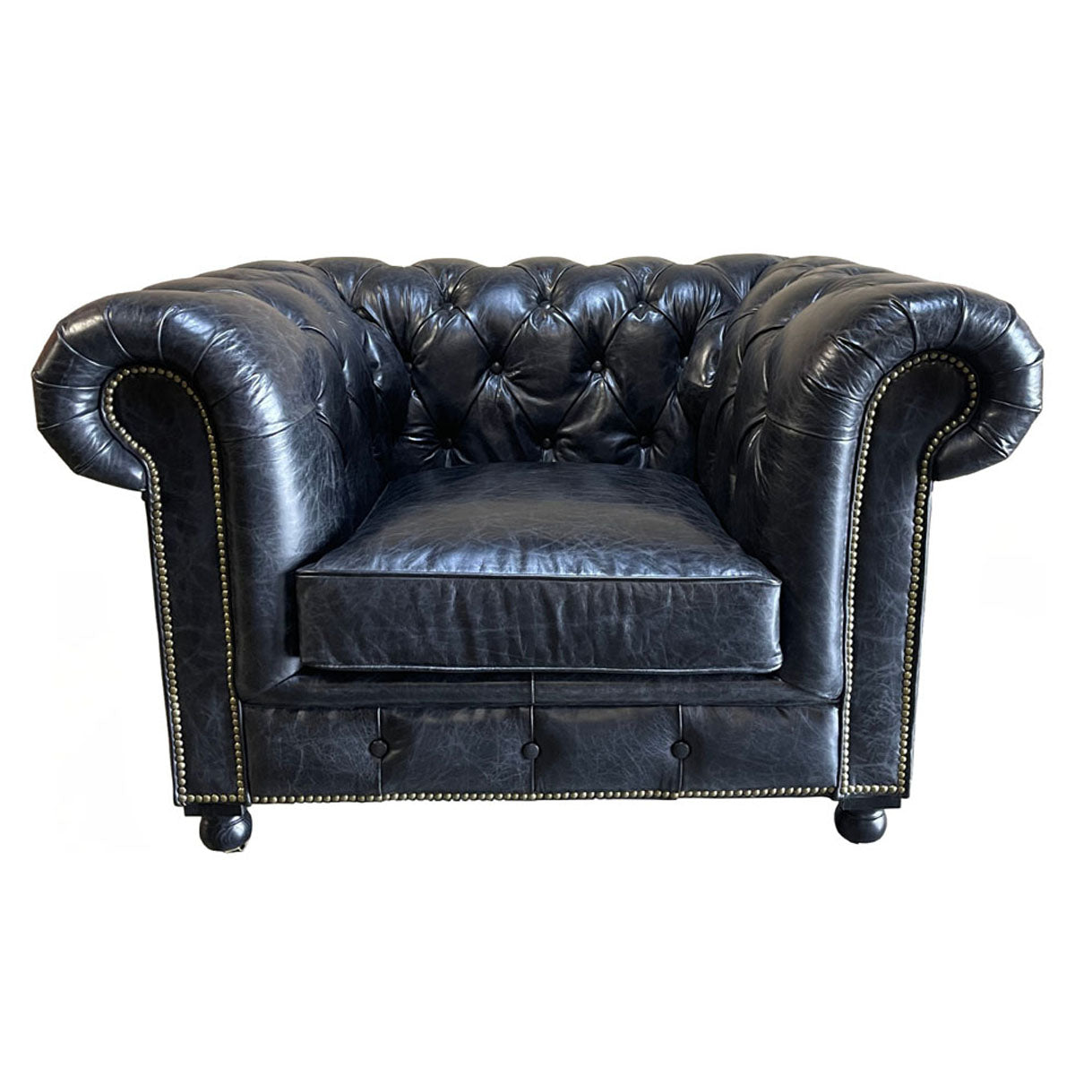 Chesterfield one-seater in espresso leather with deep button tufting and rolled arms