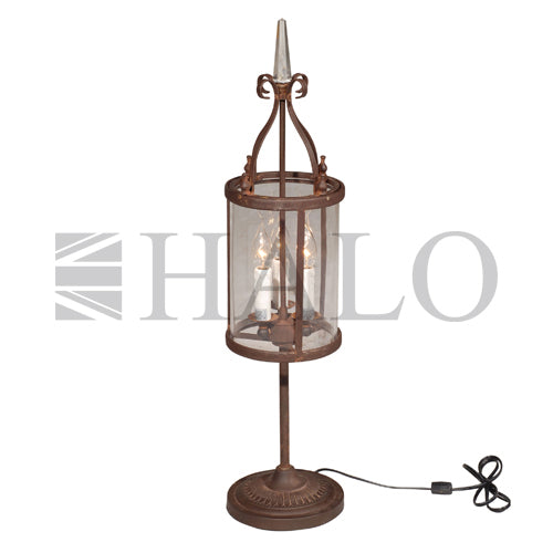 George table lamp with lantern-style enclosure and antique rust finish