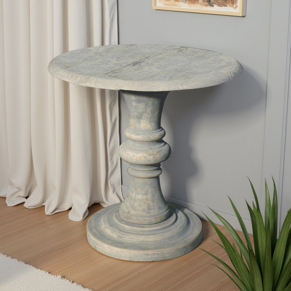Round reclaimed pine side table on a turned base in distressed grey