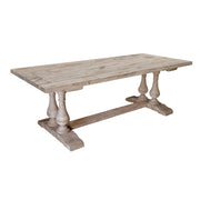 Reclaimed pine plank-style dining table with turned legs and stretcher