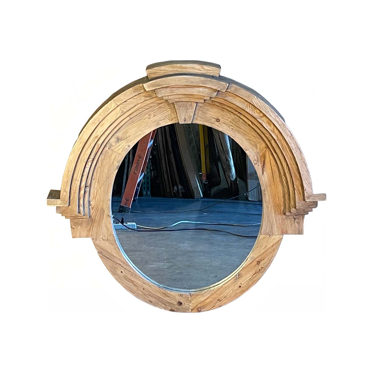 Rounded mirror framed in layered reclaimed pine