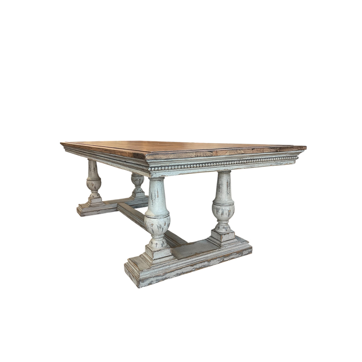 Reclaimed pine dining table with plank top and turned trestle base