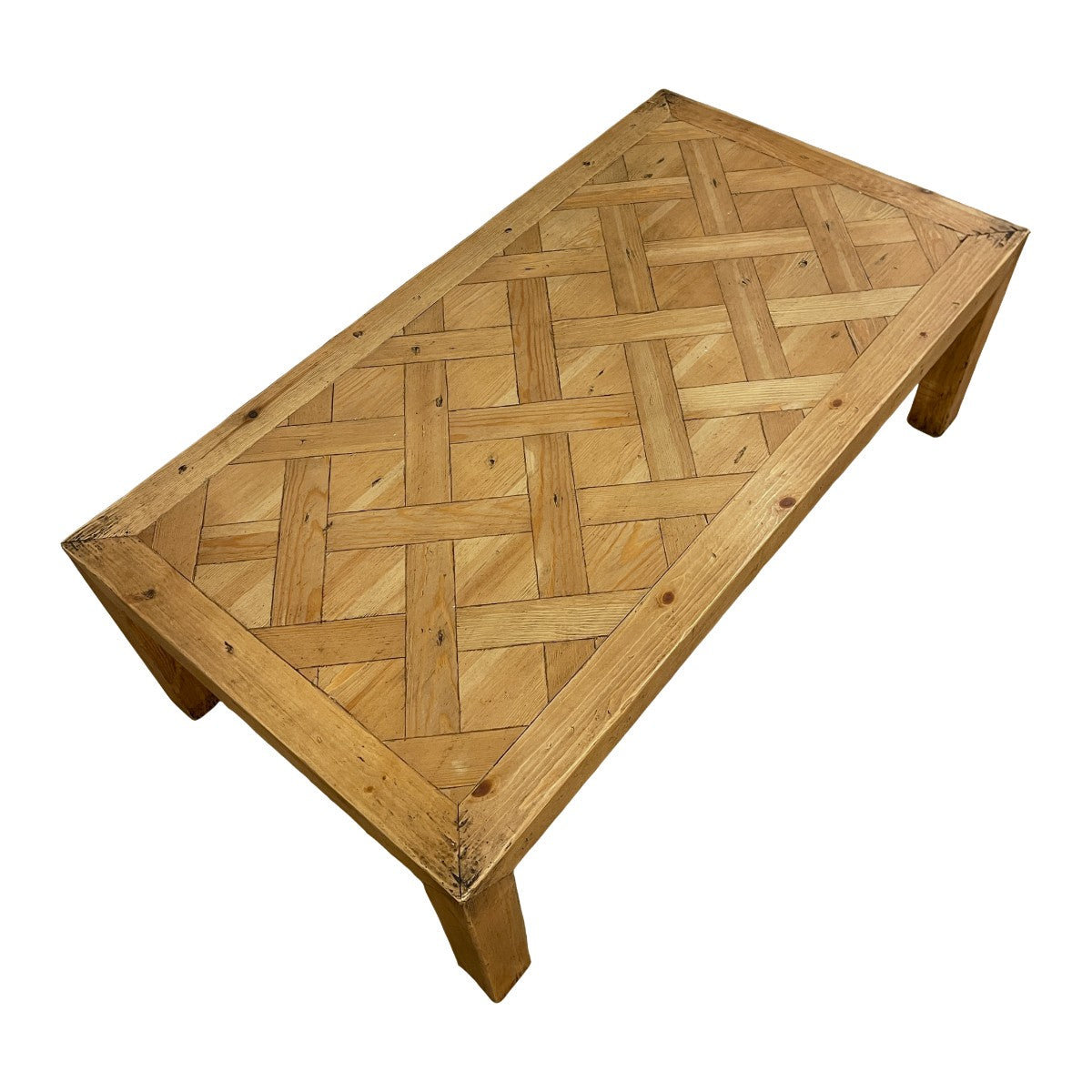 Reclaimed pine coffee table with parquet-pattern top on solid legs