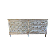 Oban reclaimed pine server with six drawers framed by carved oval detailing