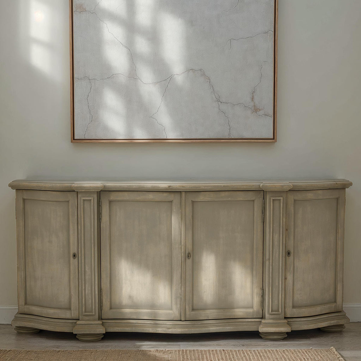 Aspatria reclaimed pine sideboard with paneled doors and a gently contoured profile