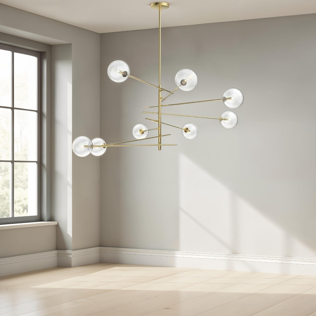 Barley brass chandelier with arms at varied lengths holding clear glass globes