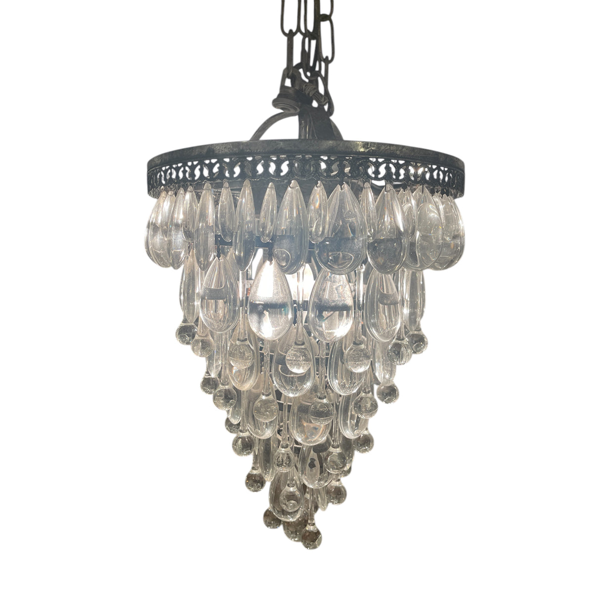 Small tapered chandelier with layered suspended glass teardrops