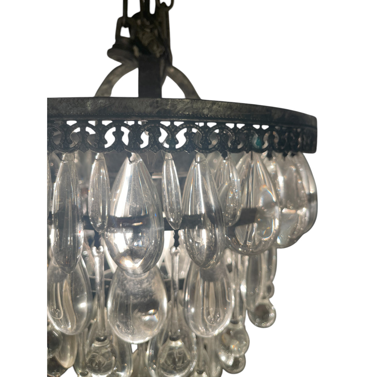 Small tapered chandelier with layered suspended glass teardrops