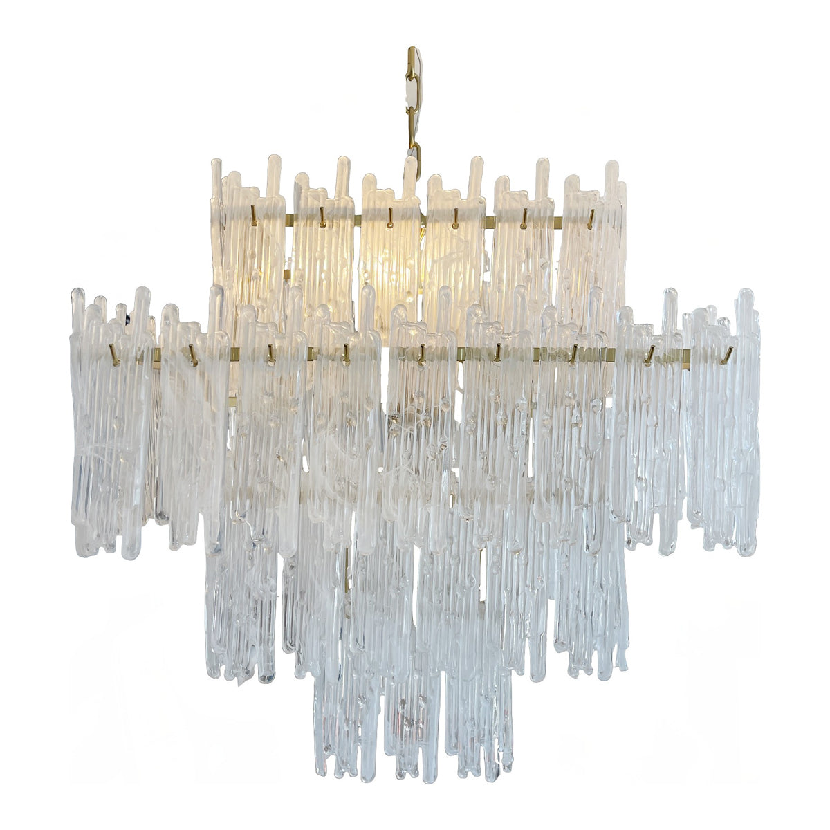 Lacy brass chandelier with dense stepped tiers of suspended glass elements