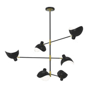 Robins chandelier with extended arms holding matte black shades, gold accents