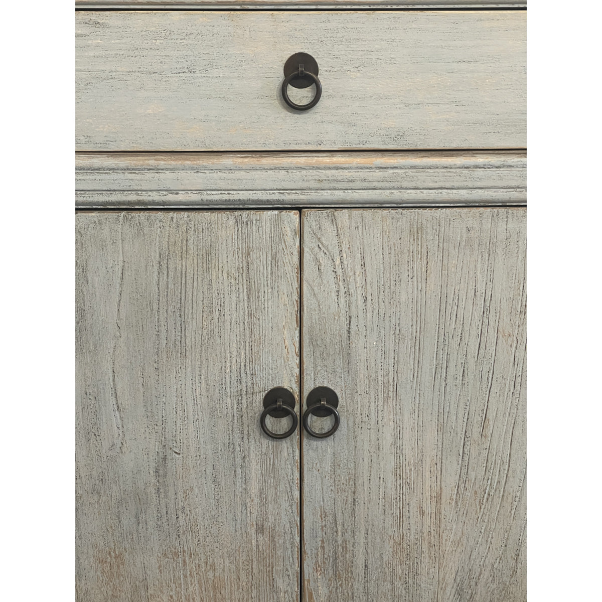 Old reclaimed pine sideboard with drawers over paneled doors in antique blue