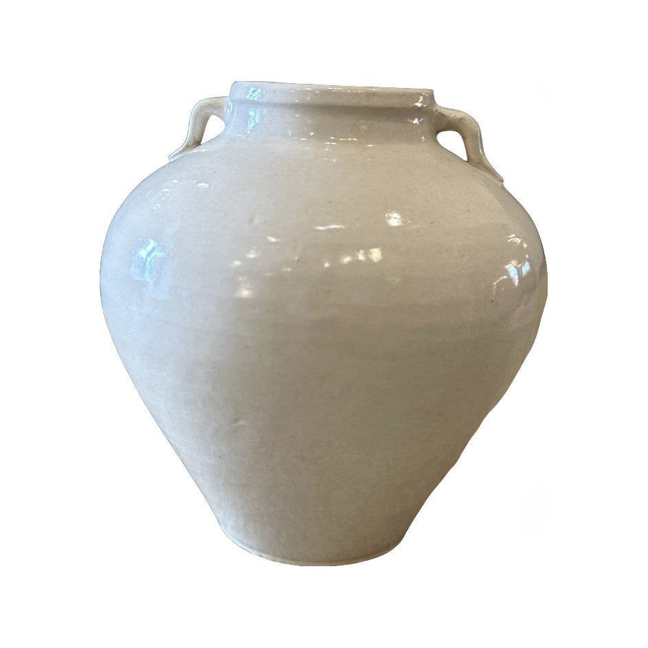 Handmade ceramic vase with a rounded body and side handles