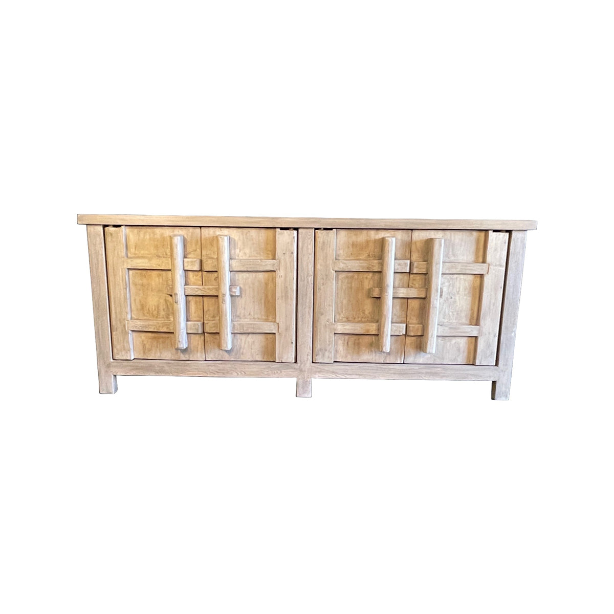 Reclaimed elm cabinet with paneled doors secured by heavy wooden bolt hardware