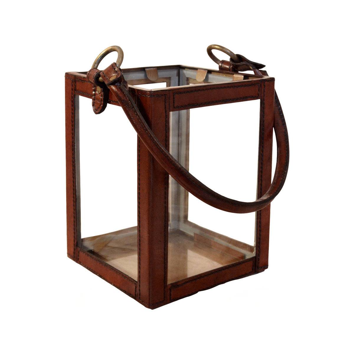 Medium hurricane lantern with a brass frame, glass panels, and leather straps