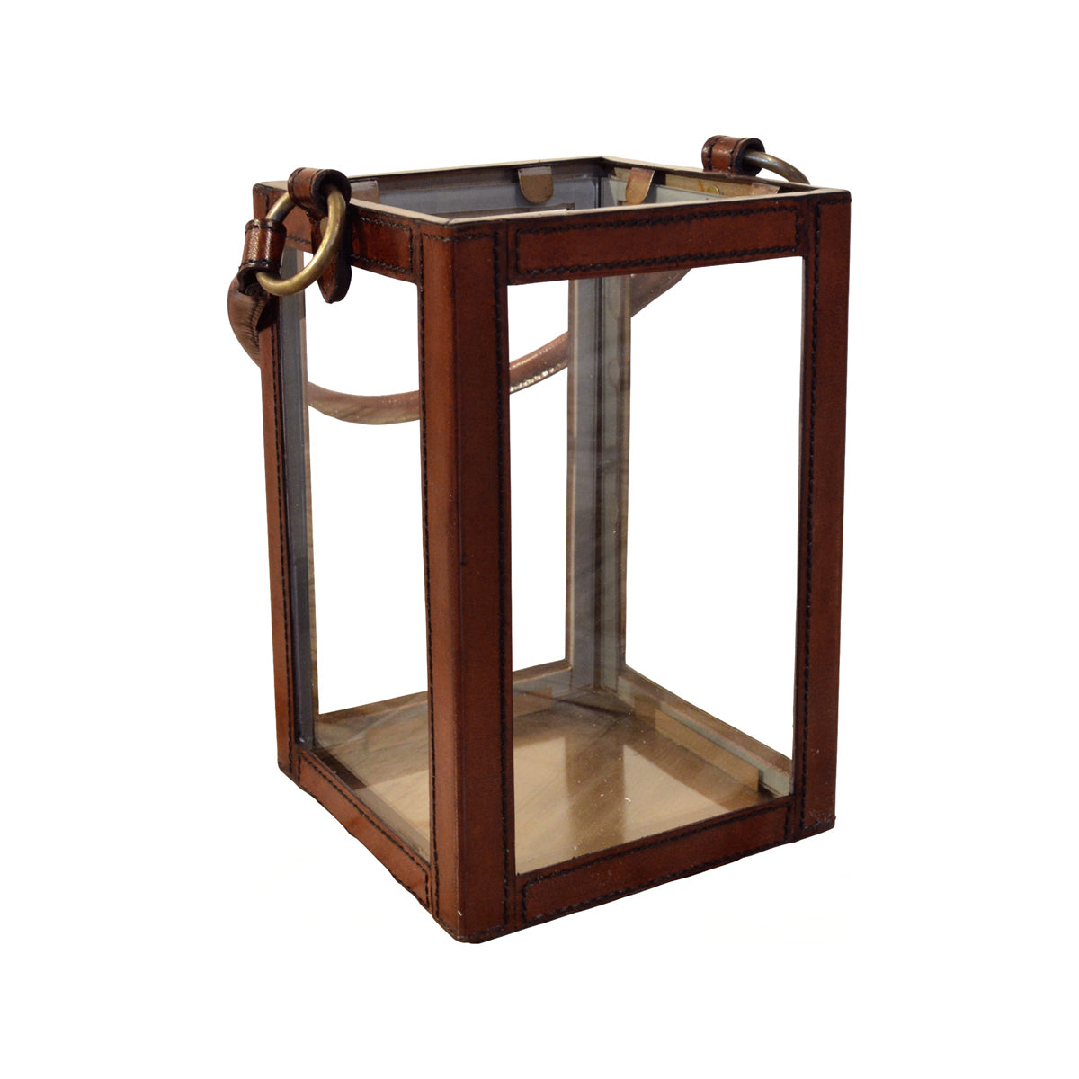 Large hurricane lantern with a brass frame, glass panels, and leather straps