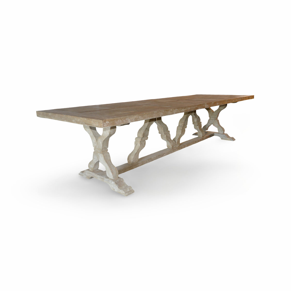 Reclaimed pine dining table in natural finish on a sculptural base