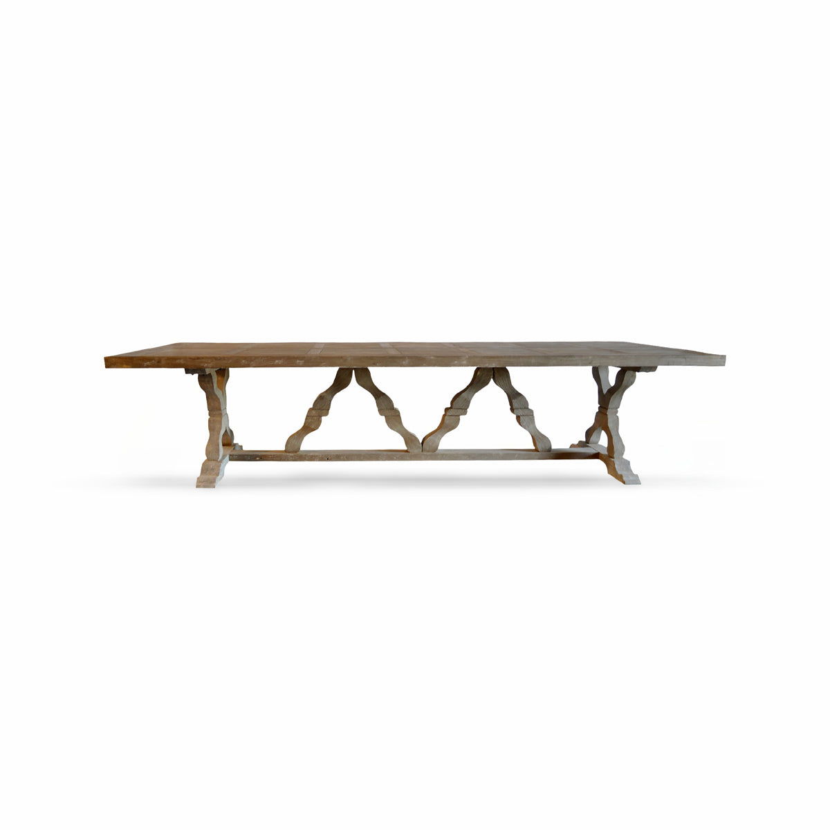 Reclaimed pine dining table in natural finish on a sculptural base
