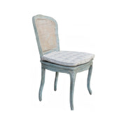 French provincial dining chair with a carved birch frame and woven cane back