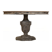 Reclaimed elm dining table on a carved pedestal base