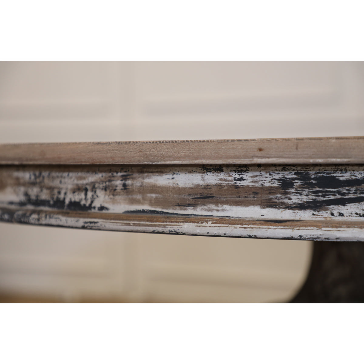 Reclaimed elm dining table on a carved pedestal base