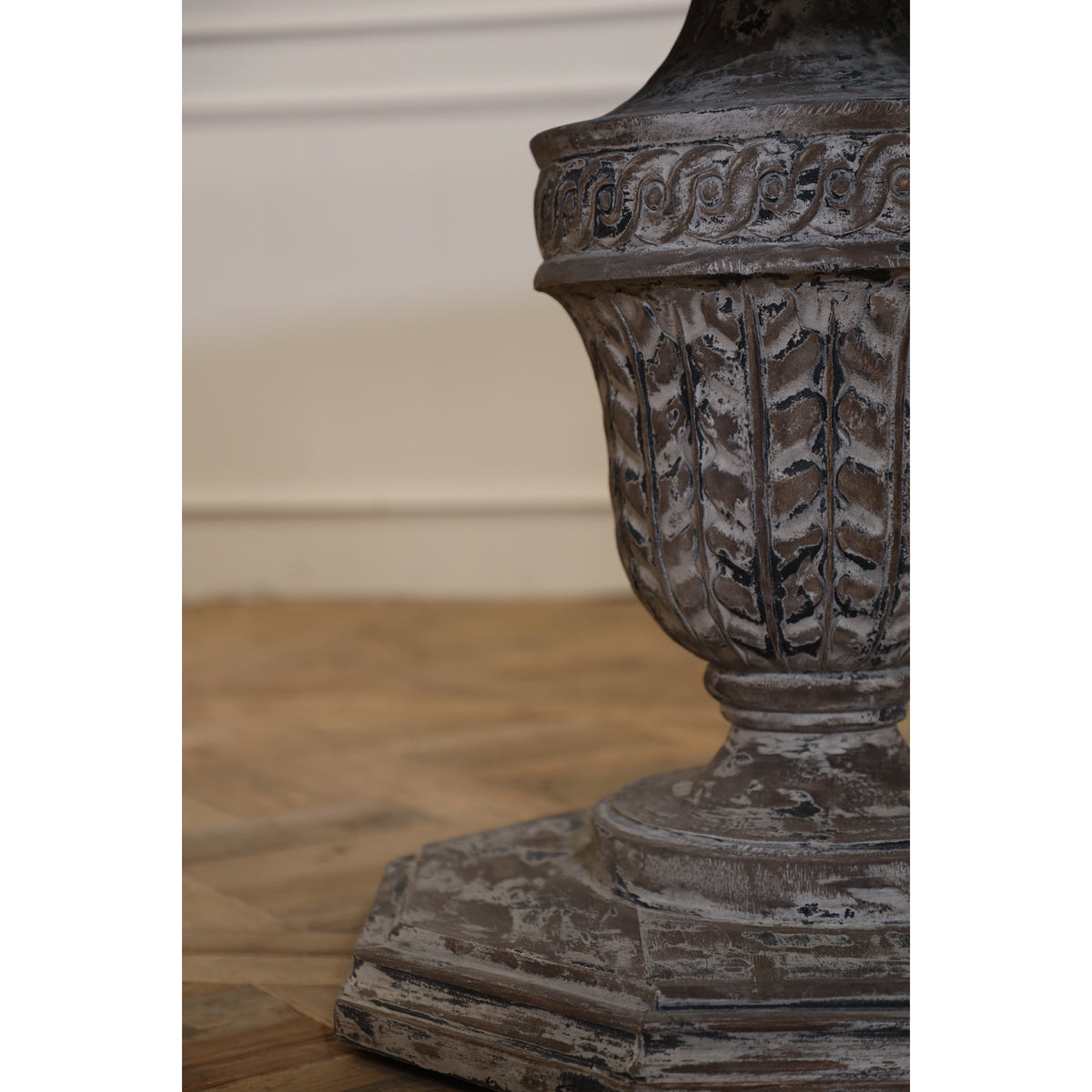 Reclaimed elm dining table on a carved pedestal base